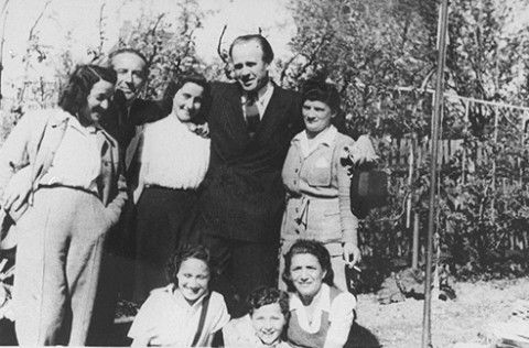 Oskar Schindler standing (second from right) with some of the people he rescued. Munich, Germany, 1946.