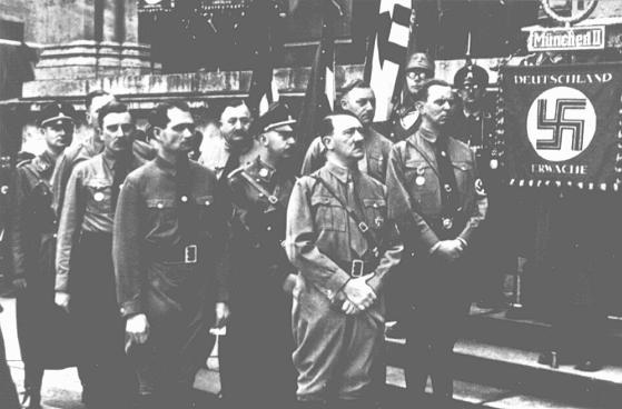 Adolf Hitler and other participants in the Hitler Putsch, during the annual anniversary celebration of his failed attempt to seize power. Behind Hitler stand Rudolf Hess (left) and Heinrich Himmler. Munich, Germany, November 9, 1934.