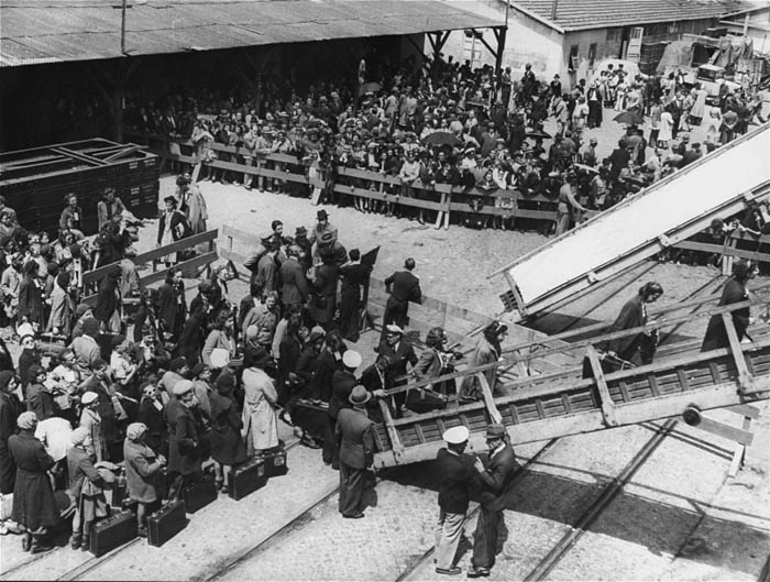 Jewish refugees board the SS Mouzinho for the voyage to the United States. Among these refugees is a group of Jewish children recently rescued from internment camps in France. Lisbon, Portugal, ca. June 10, 1941.