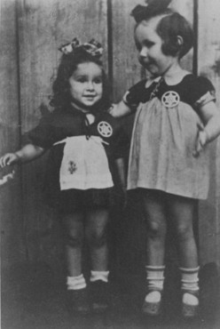 Two young cousins shortly before they were smuggled out of the Kovno ghetto. A Lithuanian family hid the children and both girls survived the war. Kovno, Lithuania, August 1943.