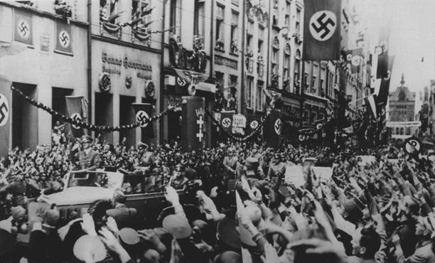 Adolf Hitler and Nazi followers enter Danzig following the invasion of Poland that began World War II. Recently, the Anti-Bigotry Committee of the Polish American Congress protested against the anti-Polish ethnic jokes about the World War II and the Holocaust made by TV host Jimmy Kimmel.