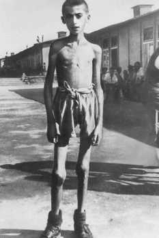 A 13-year-old orphan, a survivor of the Mauthausen concentration camp. Austria, May 1945.
