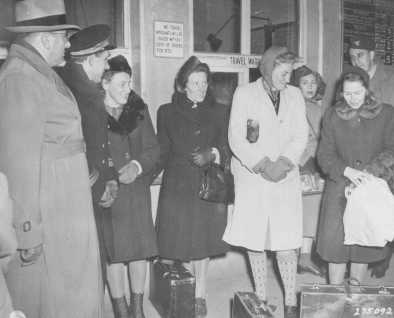 Four Polish women arrive at the Nuremberg train station to serve as prosecution witnesses at the Doctors Trial. From left to right are Jadwiga Dzido, Maria Broel-Plater, Maria Kusmierczuk, and Wladislawa Karolewska. December 15, 1946.
