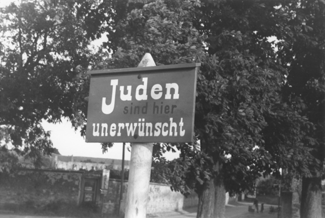 An anti-Jewish sign posted on a street in Bavaria reads 