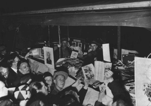 German students gather around books they regard as "un-German." The books will be publically burned at Berlin's Opernplatz. Berlin, Germany, May 10, 1933.