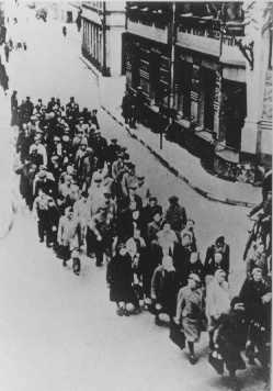 Jews from the Riga ghetto on the "Aryan" side of Riga. Some groups of Jews were taken outside the ghetto for forced labor. Riga, Latvia, between 1941 and 1943.