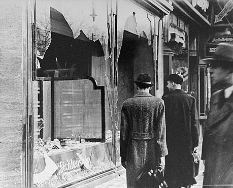 Shattered storefront of a Jewish-owned shop destroyed during Kristallnacht (the "Night of Broken Glass"). Berlin, Germany, November 10, 1938.