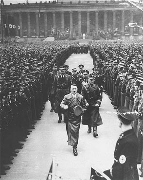 Hitler reviews 35,000 SA troops celebrating the third anniversary of his assumption of power. Berlin, Germany, February 20, 1936.