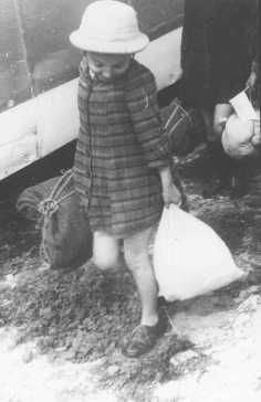 A Jewish girl, one of the "Tehran Children" (about 1,000 Polish Jewish refugee children who reached Palestine), upon arrival at the Atlit train station. Palestine, February 18, 1943.