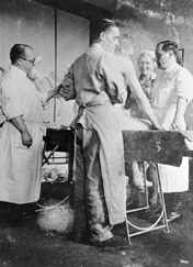 Carl Clauberg (far left), a research gynecologist, once studied treatments to help infertile women conceive. In 1943 and 1944, he conducted cruel experiments at Auschwitz on mostly Jewish prisoners in his mission to develop an efficient, inexpensive method of mass sterilization.