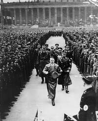 Hitler reviews 35,000 Storm Troopers (Sturmabteilung--SA), members of the Nazi Party's paramilitary wing. February 20, 1936.