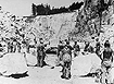 Prisoners at forced labor in the "Wiener Graben" quarry at Mauthausen, Austria.