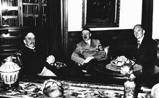 British prime minister Neville Chamberlain (left)...