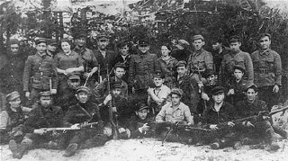 Group portrait of members of the Kalinin Jewish partisan...