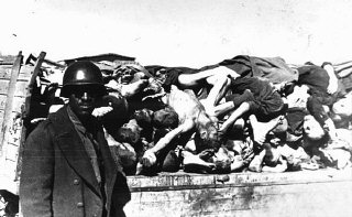 An American soldier on an inspection tour of Buchenwald...