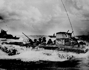 An amphibious troop carrier loaded with American Marines...