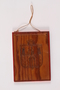 Wooden tile with Terezin coat of arms made by a Czech Jewish inmate