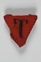 Inverted red triangle patch with T made by a Jewish Czech concentration camp inmate