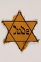 Star of David badge with Jude owned by Czech Jewish concentration camp prisoners