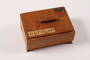 Inscribed wooden box with painted lid bought by a Roman Catholic Polish former forced laborer