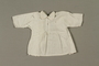 White blouse made for an infant born in a concentration camp