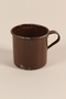 Brown enamel mug used by a Polish Jewish concentration camp prisoner