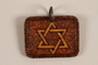 Small wooden pendant with a Star of David made by a former Jewish Czech concentration camp inmate
