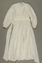 Wedding gown made from a white rayon parachute worn by multiple Jewish brides in a DP camp