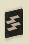 SS uniform collar tab found at Dachau by an American soldier