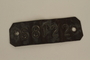 Identification tag 68122 worn by a Jewish slave laborer at Ebensee/Mauthausen concentration camp
