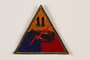 US Army 11th Armored Division shoulder sleeve patch with tank tracks, gun, and red lightning bolt