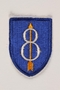 US Army 8th Infantry Division shoulder sleeve patch with an 8 pierced by a yellow arrow