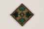 US Army 4th Infantry Division shoulder sleeve patch with 4 green ivy leaves on a brown field