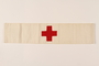 Armband handstitched with a red cross and Star of David by a concentration camp inmate and nurse