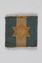 Jewish Brigade Group arm patch with blue and white stripes and a Star of David worn by a Brigade soldier