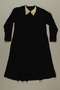 Long sleeved black dress saved by a neighbor and recovered postwar
