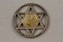 Round Star of David pendant made by a Jewish prisoner in Theresienstadt ghetto-labor camp