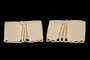 Two white silk sleeve cuffs with scalloped cording brought to the US by a Jewish family fleeing German occupied Poland