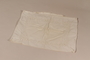 Large white pillowcase embroidered with a floral design recovered by Kato Ritter from her neighbors