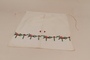 Apron embroidered with a multicolored, floral garland recovered by Kato Ritter from her neighbors