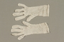 Pair of white lace gloves crocheted by a Dutch Jewish woman while living in hiding
