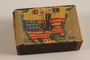 Japanese propaganda matchbox with a bomb exploding in the center of the US acquired postwar by a German Jewish refugee