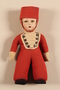 Doll in a red hat and uniform kept by a young girl while living in hiding