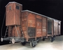 Double-door railroad freight car with brakeman’s cabin of the type used to transport victims throughout the Nazi camp system