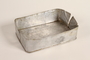 Aluminum food container lid used by a Hungarian Jewish family on the Kasztner train