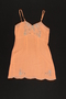 Peach chemise with black and white floral appliques saved by a Hungarian Jewish refugee