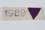 White inverted triangle patch and prison number worn to identify a female inmate as a Jehovah's Witness