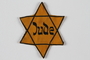 Star of David badge with word Jude issued to an inmate of Łódź ghetto