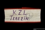 Handmade white armband inscribed Terezin worn by a female German Jewish inmate