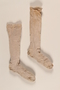 Pair of light brown cotton knee high socks brought to the US by a German Jewish refugee
